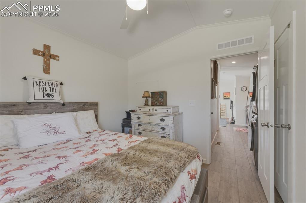 Image 19 of 23: Lots of natural light in the bedroom! Conveniently located in the back of t