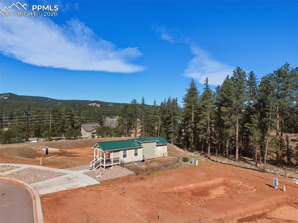 Image 22 of 23: Property to the right will be built likely this year, but the property to t