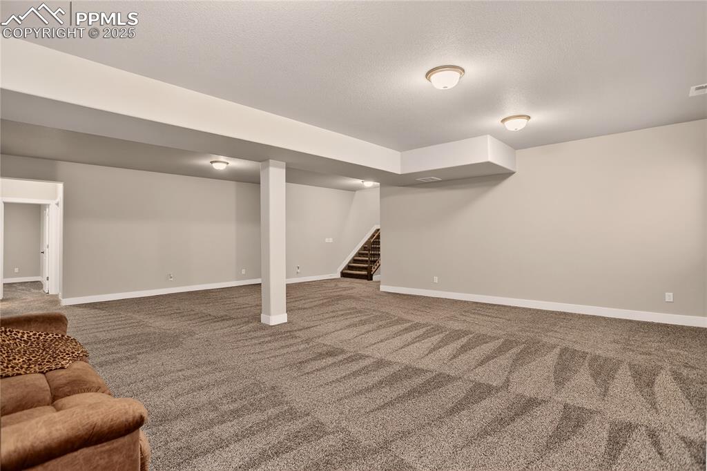 Image 27 of 38: Finished Basement Rec Room