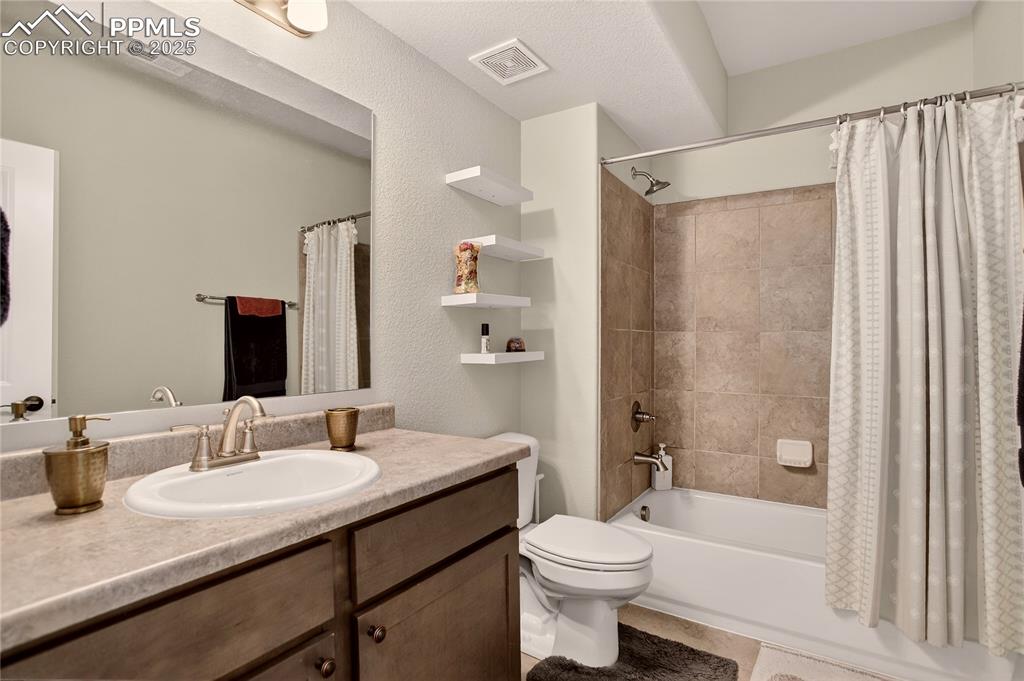 Image 31 of 38: Full guest bath - lower level