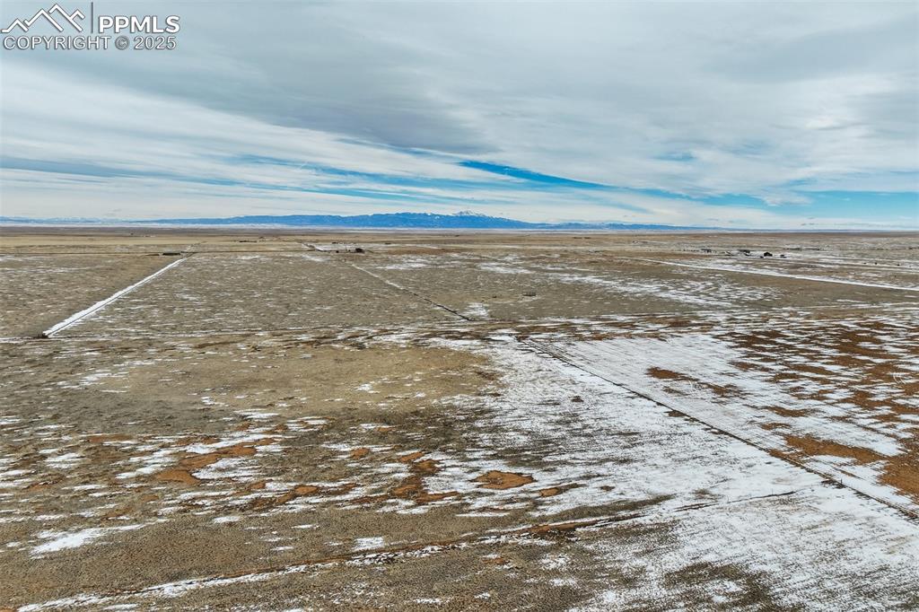 Image 17 of 26: Property view of water featuring a mountain view
