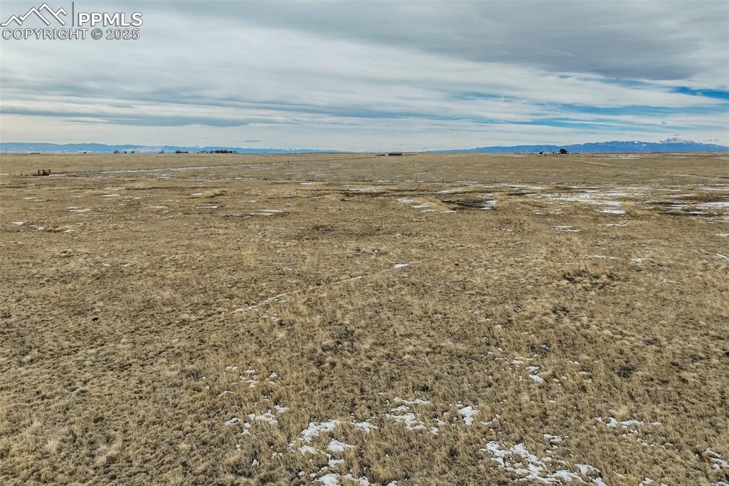 Image 23 of 26: Property view of water featuring a mountain view