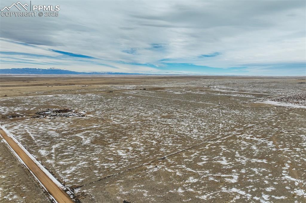 Image 26 of 26: Birds eye view of property with a mountain view