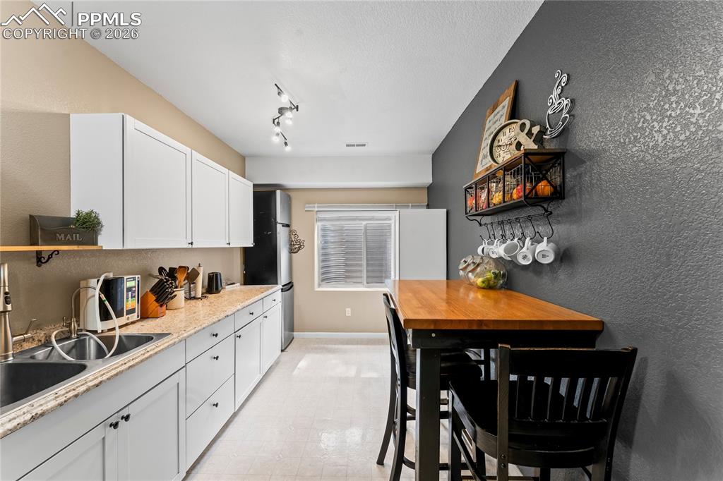 Image 28 of 50: 2nd Kitchen