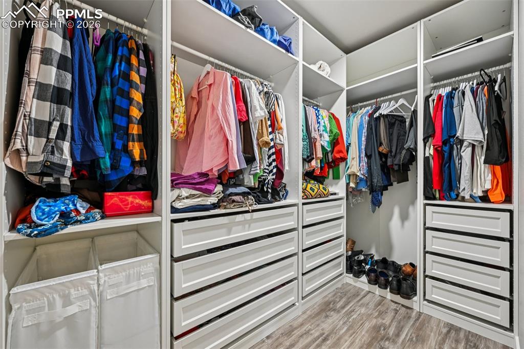 Image 27 of 47: Primary custom closet