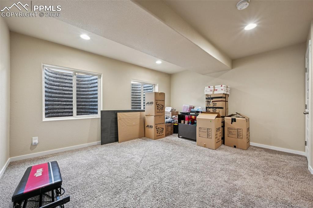 Image 32 of 47: One of two basement family/game rooms
