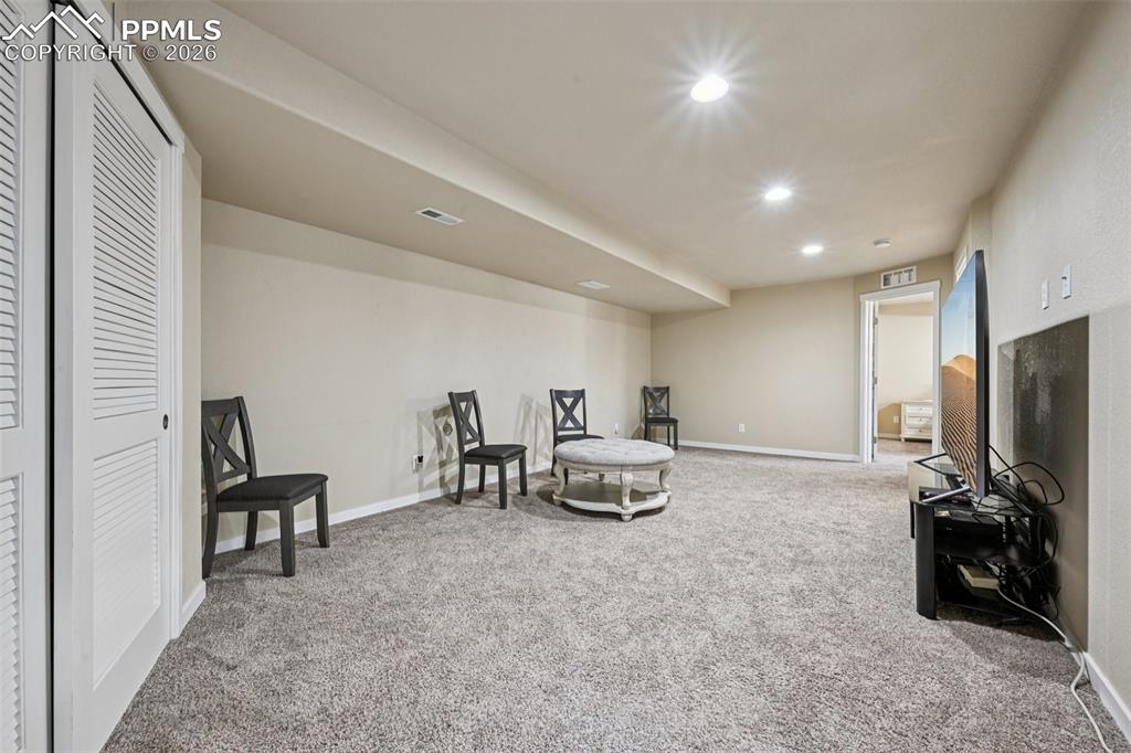 Image 34 of 47: One of two basement family/game rooms