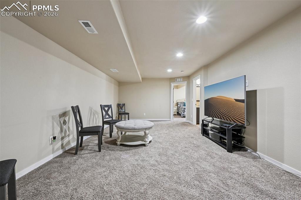 Image 35 of 47: One of two basement family/game rooms