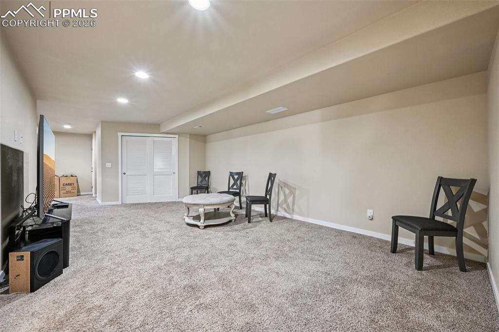 Image 38 of 47: One of two basement family/game rooms