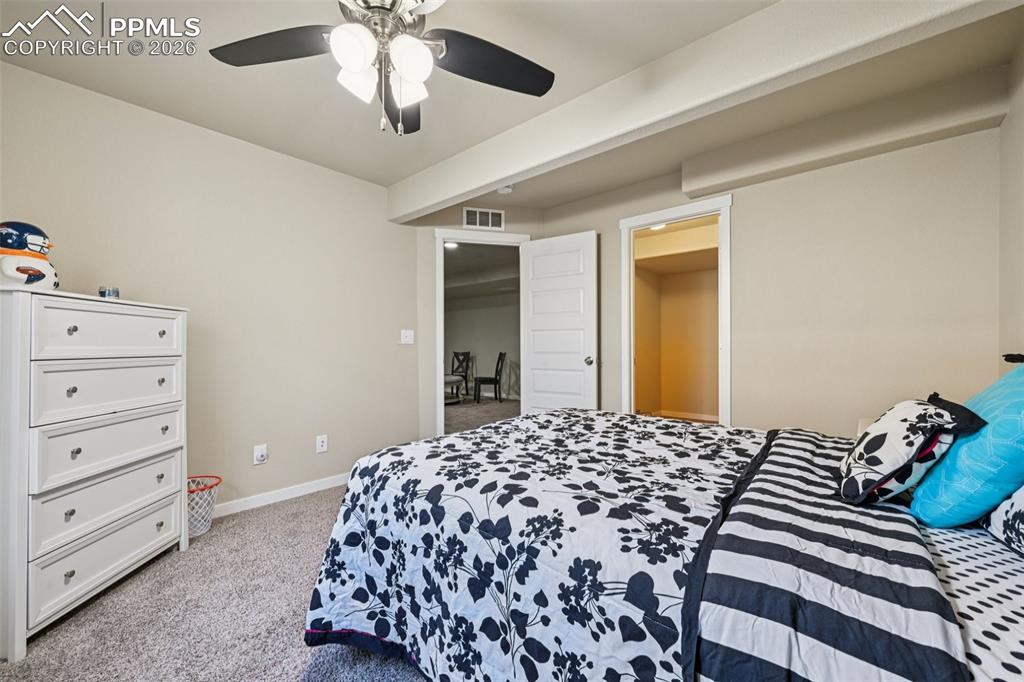 Image 41 of 47: Basement Bedroom with walk-in closet