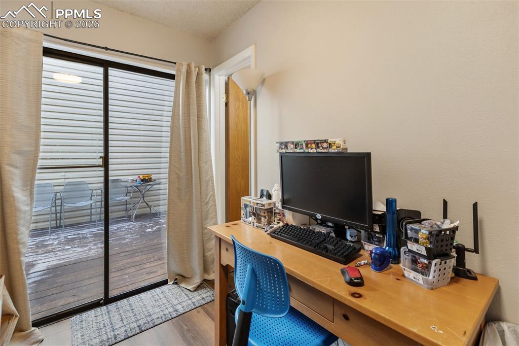 Image 14 of 41: Slider from Mudroom to front Deck