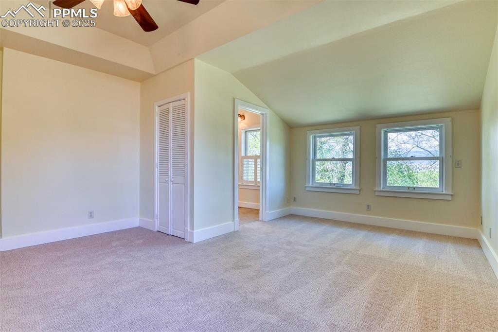 Image 38 of 50: Spacious primary suite with several closets and views!