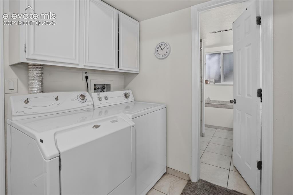 Image 15 of 32:  - laundry space with garage access