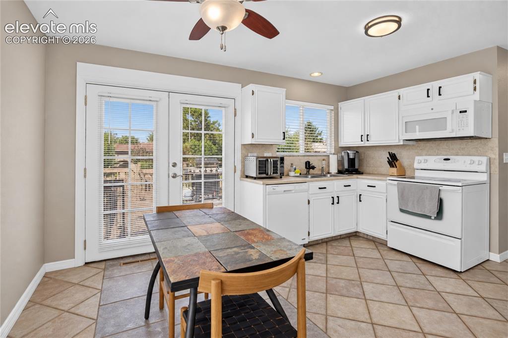 Image 21 of 32: - dining area w/ walk-out to deck