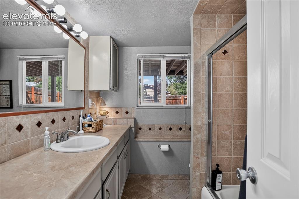 Image 29 of 32:  - lower level bathroom