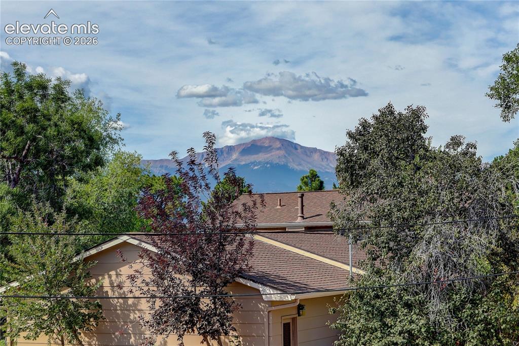 Image 7 of 32: Pikes Peak views from the decks of both units