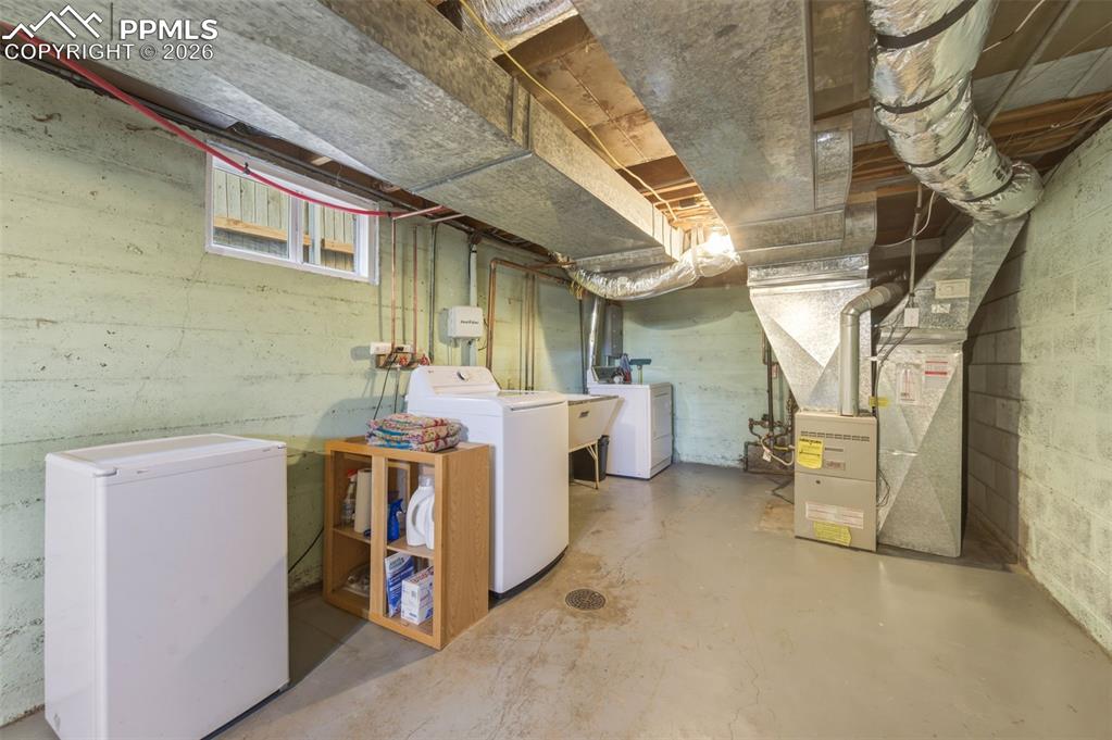Image 31 of 50: Laundry Room In Basement