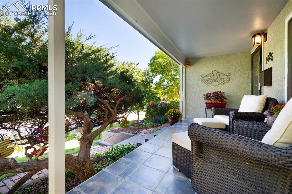 Image 43 of 50: Looking Out From Front Porch