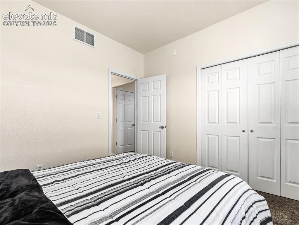 Image 19 of 49: Recessed lighting, interior paneled doors, and bi-fold closet doors