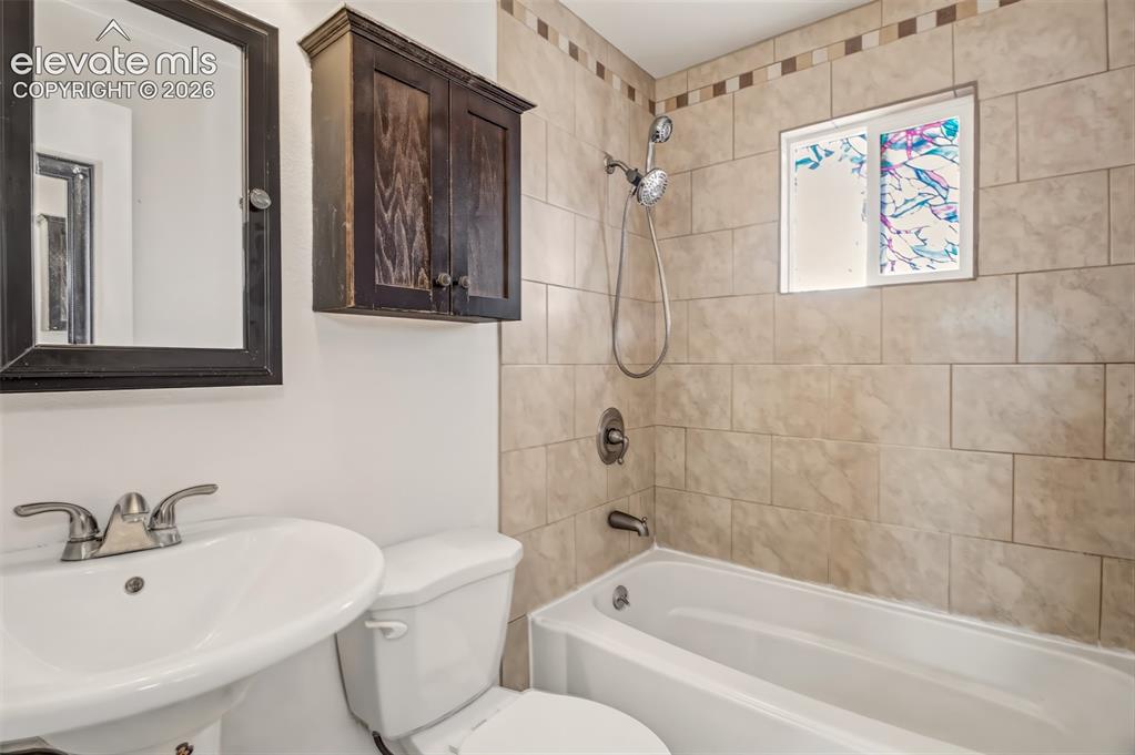 Image 11 of 19: Full bathroom located near Primary bedroom and bedroom 2