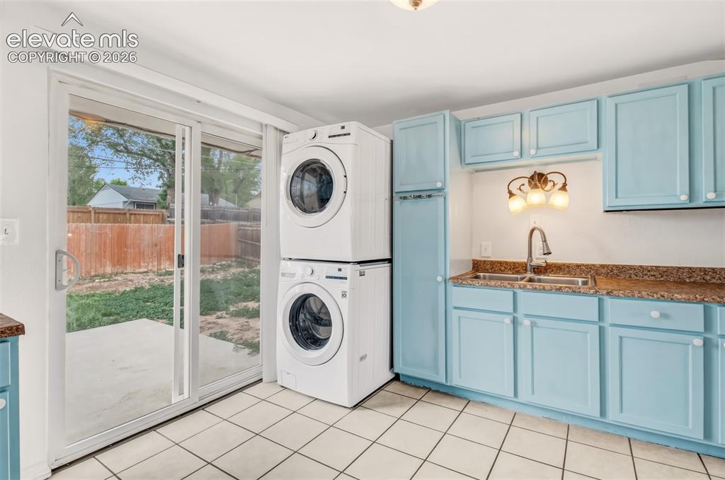 Image 8 of 19: Kitchen with walk out to backyard