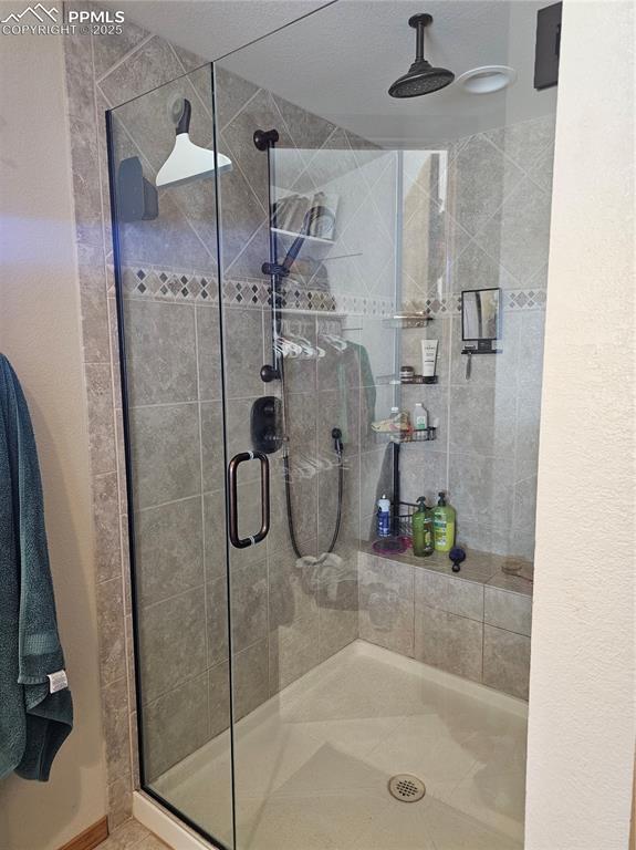 Image 16 of 44: Master Bathroom with a shower stall