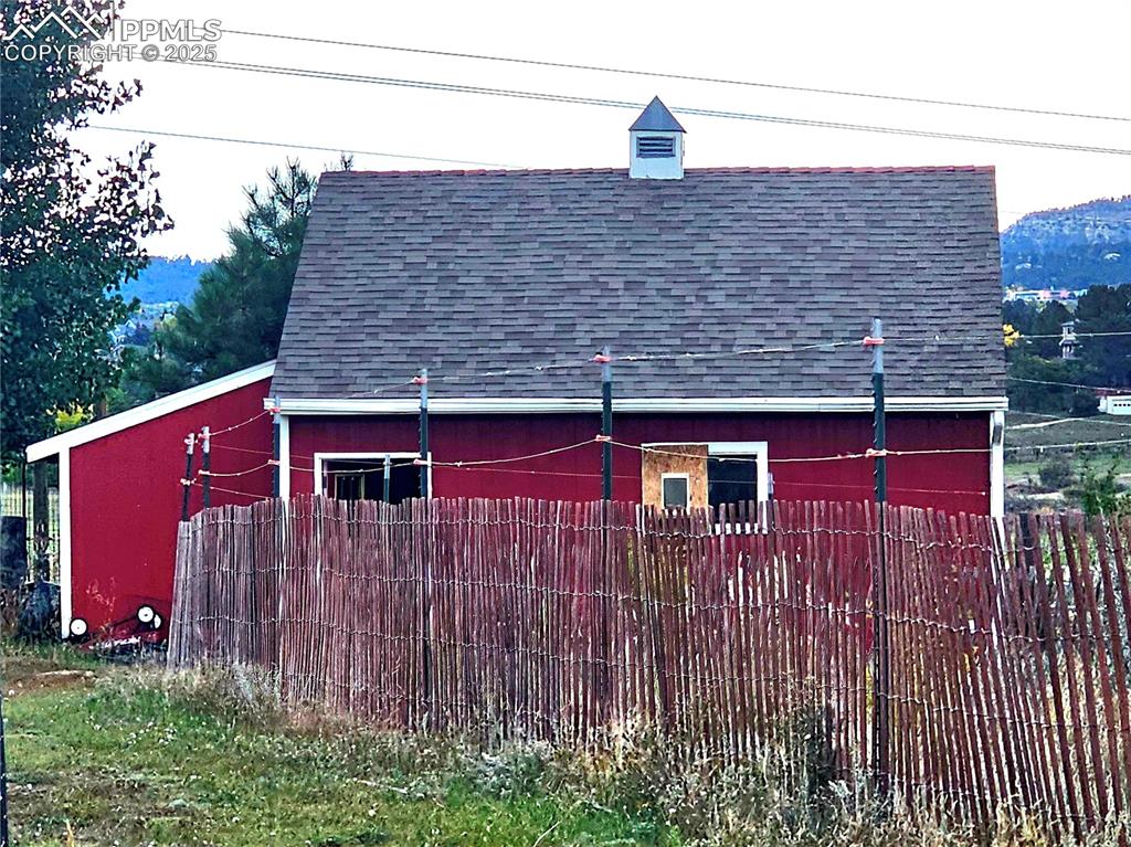 Image 29 of 44: Little red barn with Duck Coop