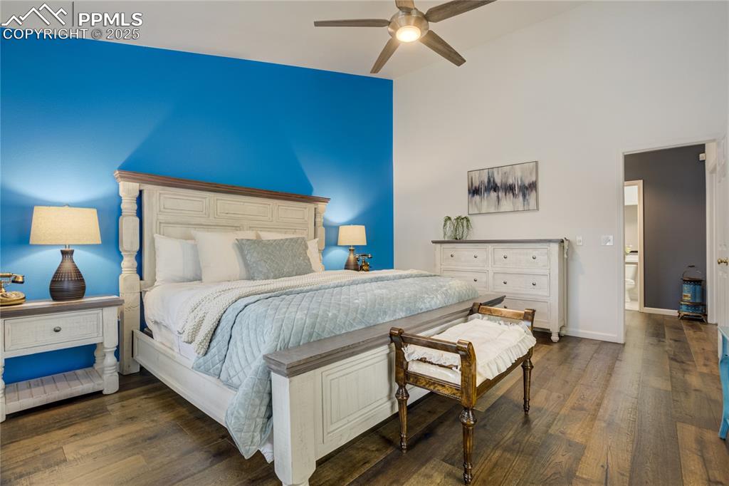 Image 18 of 43: Primary suite with vaulted ceiling  