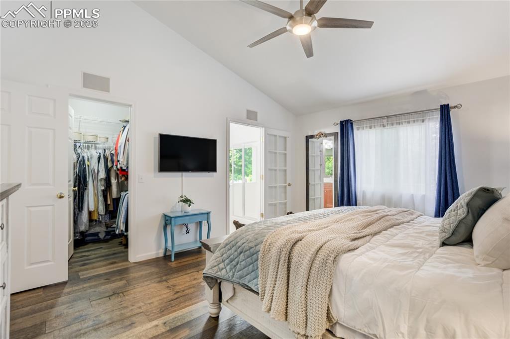 Image 19 of 43: Large walk-in closet and attached bath