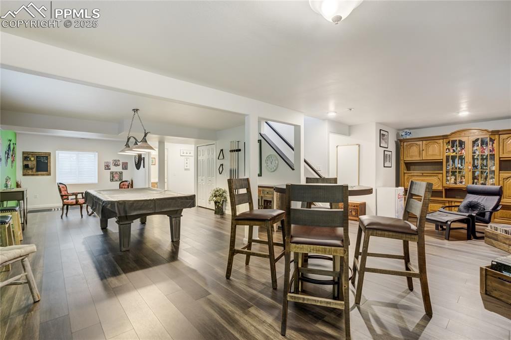 Image 27 of 43: New luxury vinyl throught basement