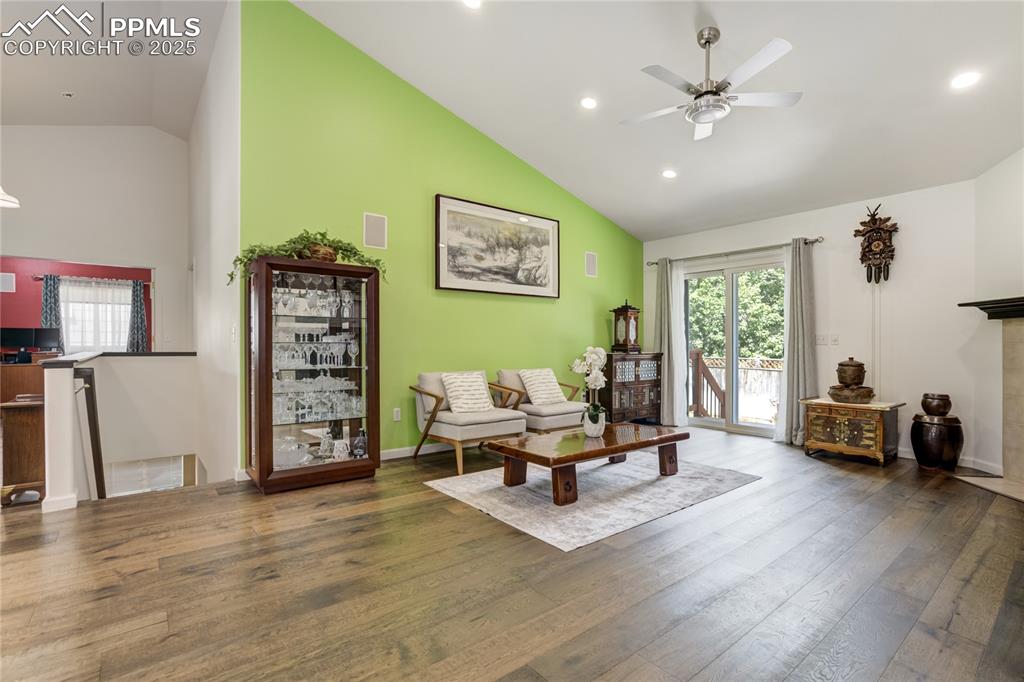 Image 8 of 43: Bright, open Living Room with walk-out