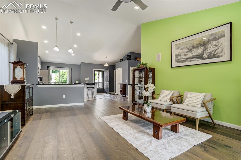 Image 9 of 43: Kitchen opens to spacious Living Room
