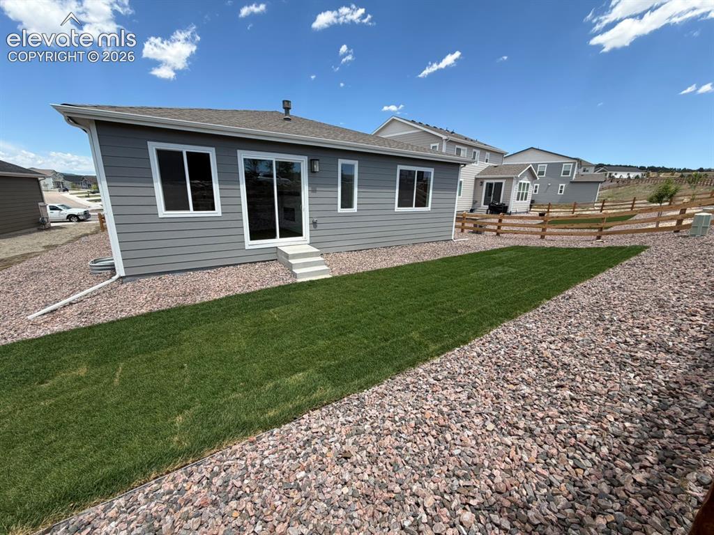 Image 21 of 24: Backyard Landscape Included