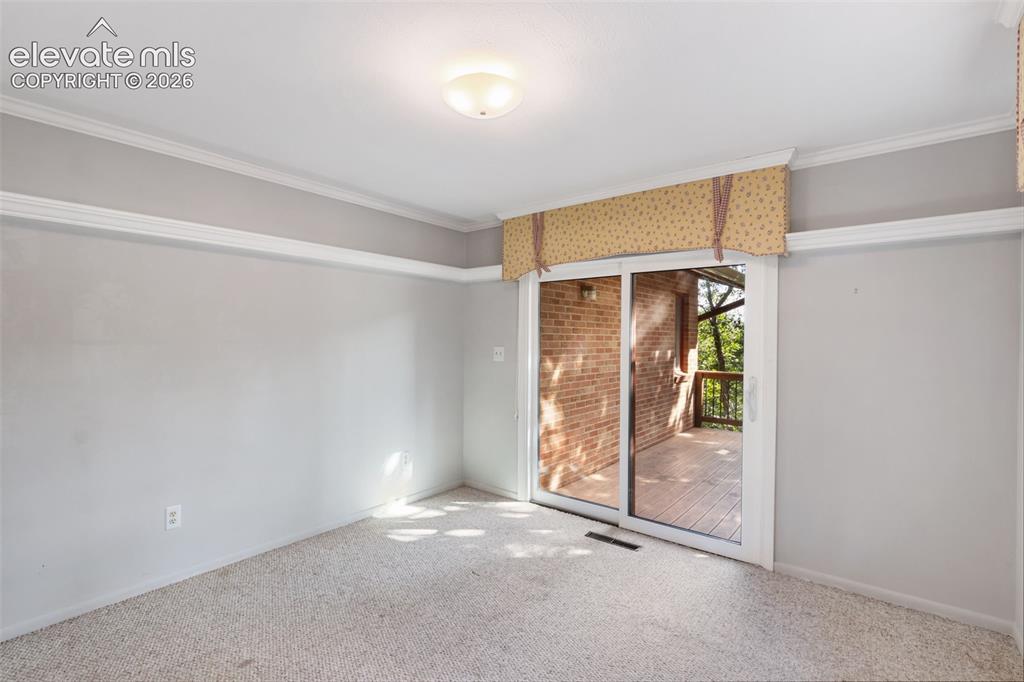 Image 31 of 47: Sliding door to Private deck