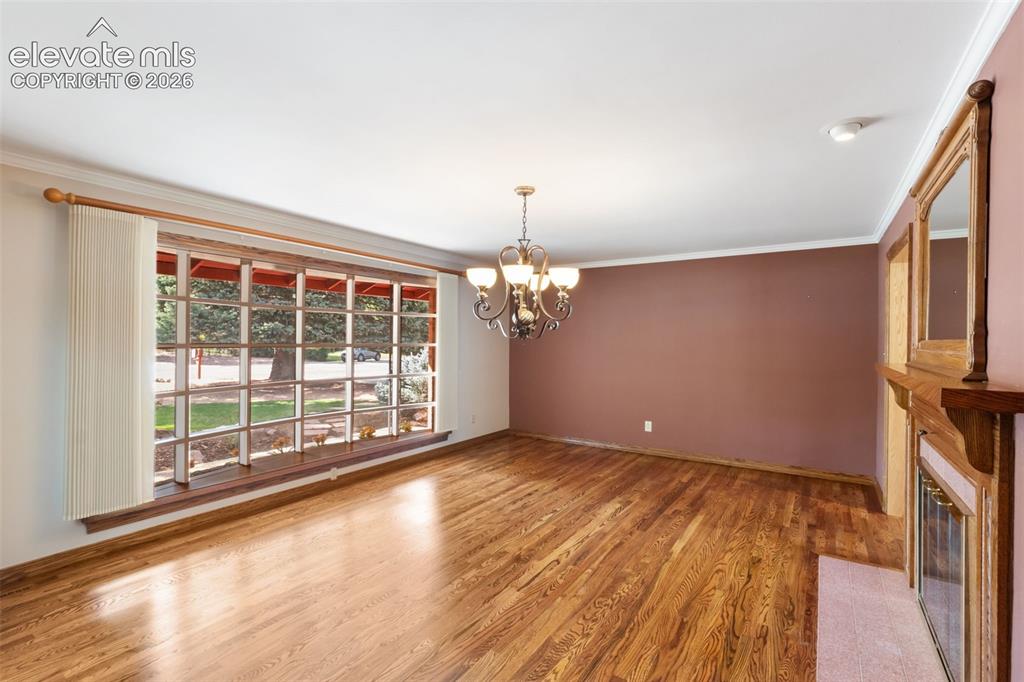 Image 4 of 47: Large Bay window looking out to front yard