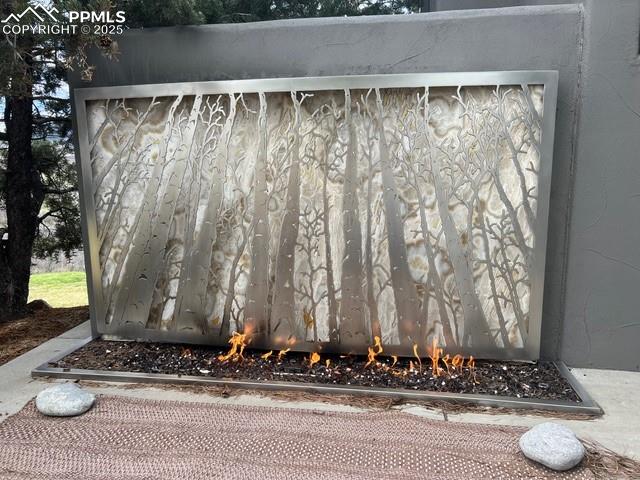 Image 27 of 48: Gas Fireplace Right outside of the office!