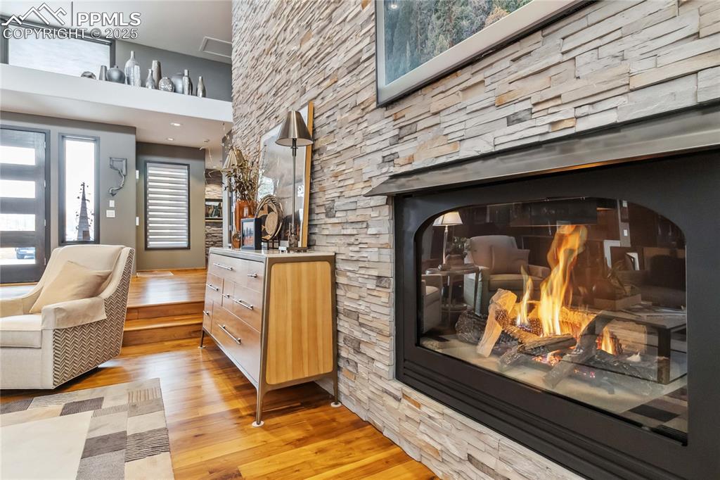 Image 8 of 48: Gas fireplace in stone accent wall!