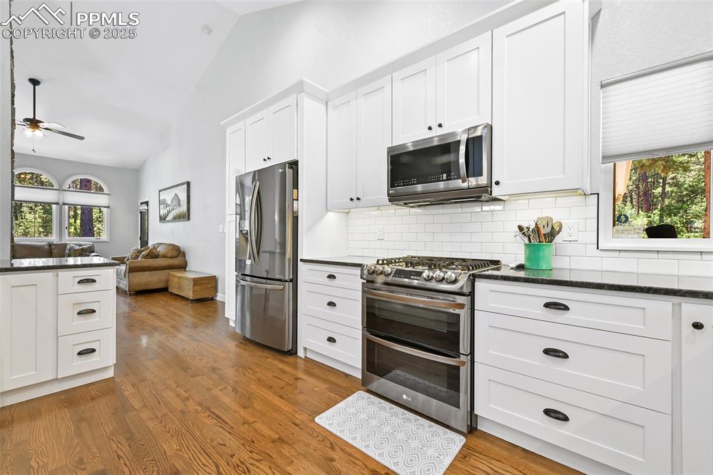 Image 12 of 50: Loads of storage and New dark stainless appliances