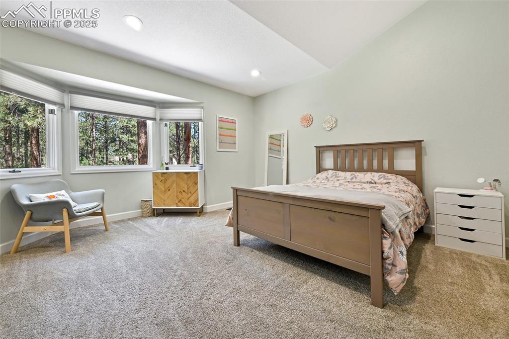 Image 23 of 50: Wonderful natural views out of bay window in second main level bedroom