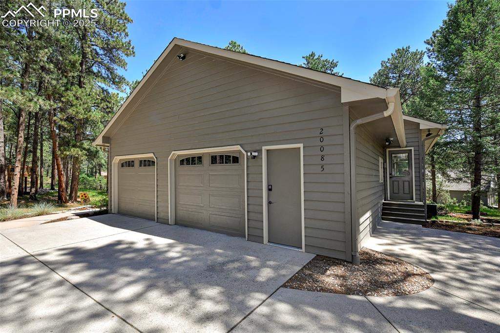 Image 40 of 50: Oversized two and a half car garage!