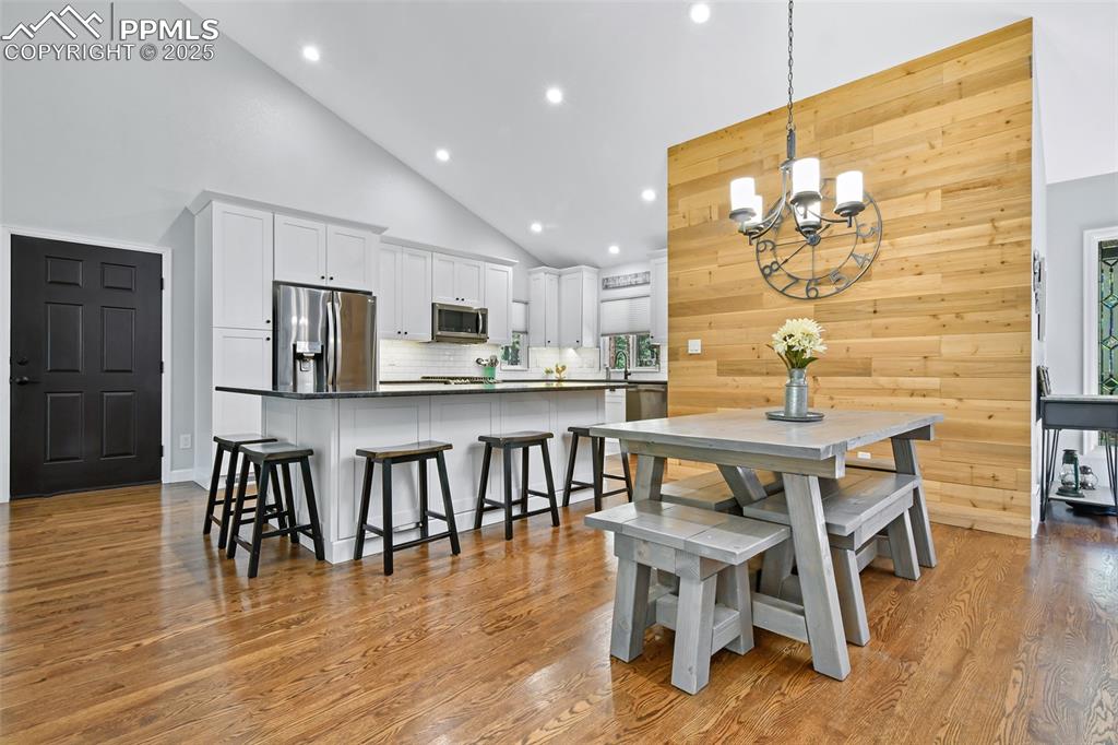 Image 9 of 50: Open to farmhouse chic kitchen!