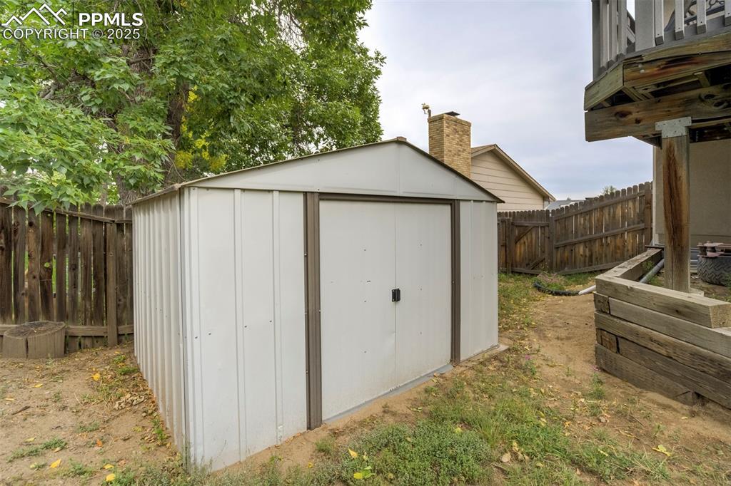 Image 26 of 26: Extra storage for your lawn accessories