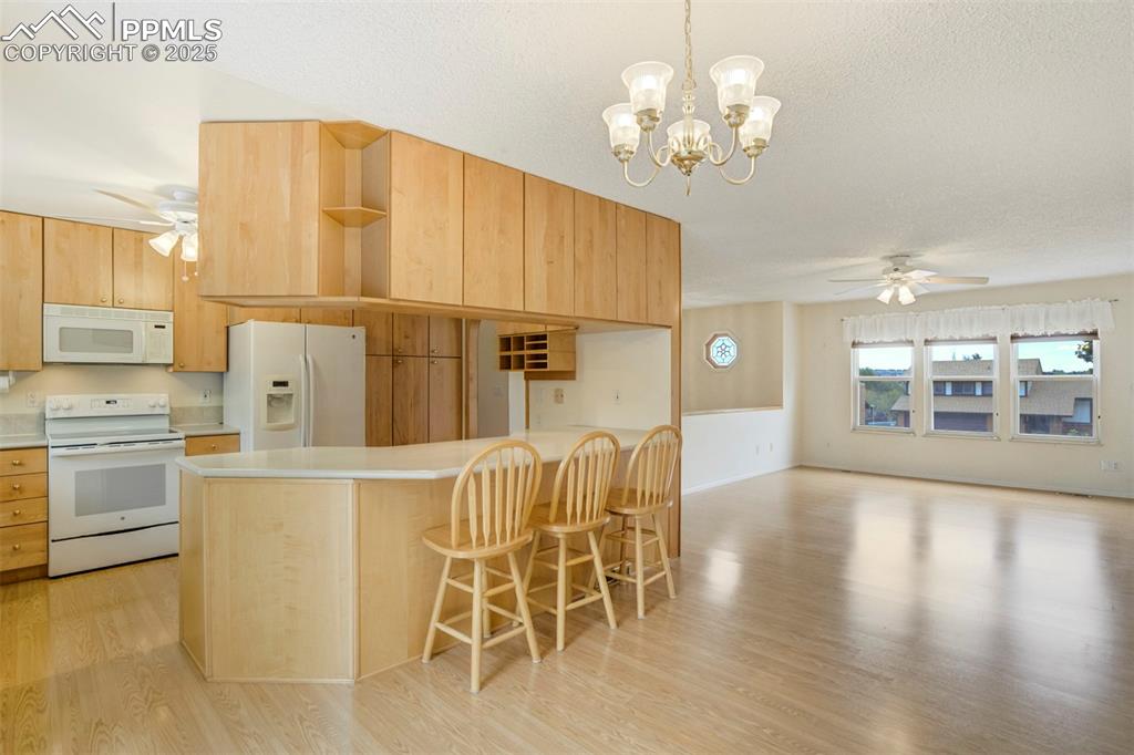 Image 5 of 26: Kitchen, Dining Area open to Great Room