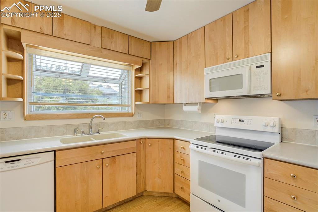 Image 7 of 26: Window above sink