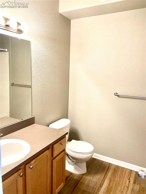 Image 11 of 21: Bathroom with one vanity, toilet, tub/shower combo