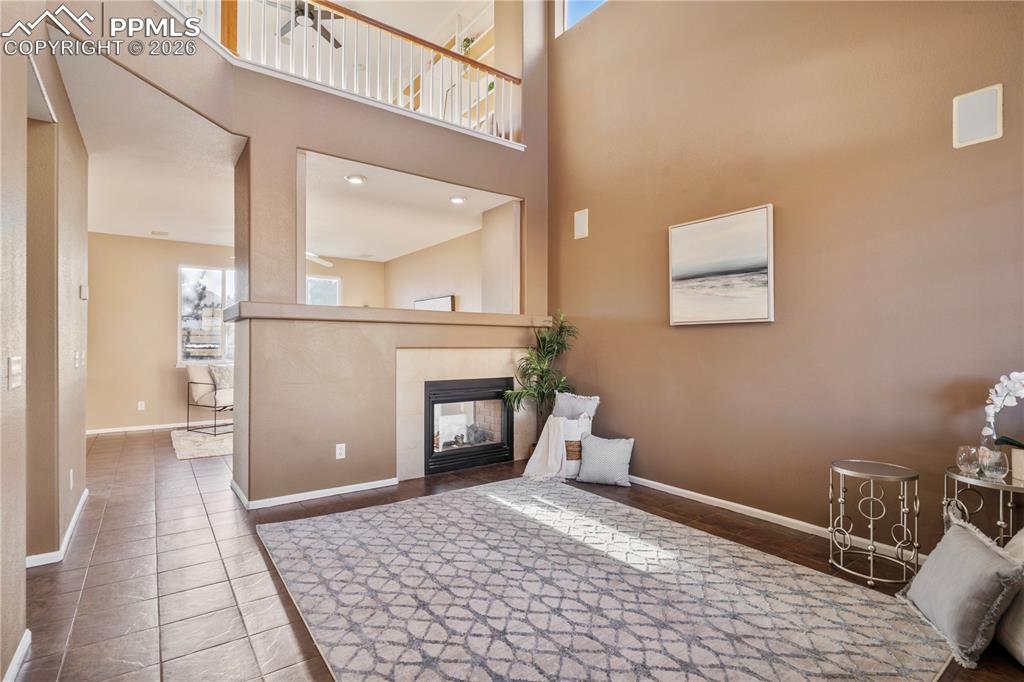 Image 14 of 28: This entry is beautiful with views of the upper loft living space.