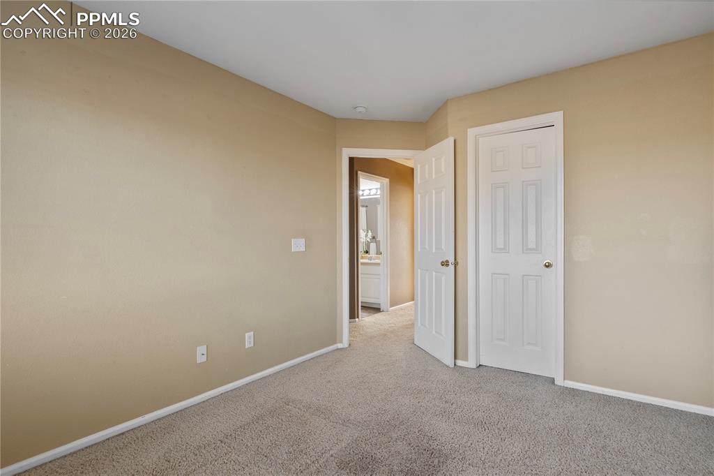 Image 23 of 28: Bedroom with walk in closet.