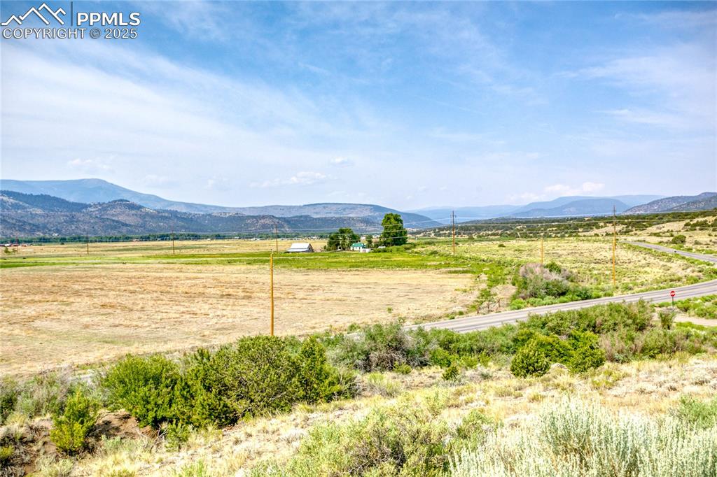Image 44 of 50: View of mountain background featuring rural landscape