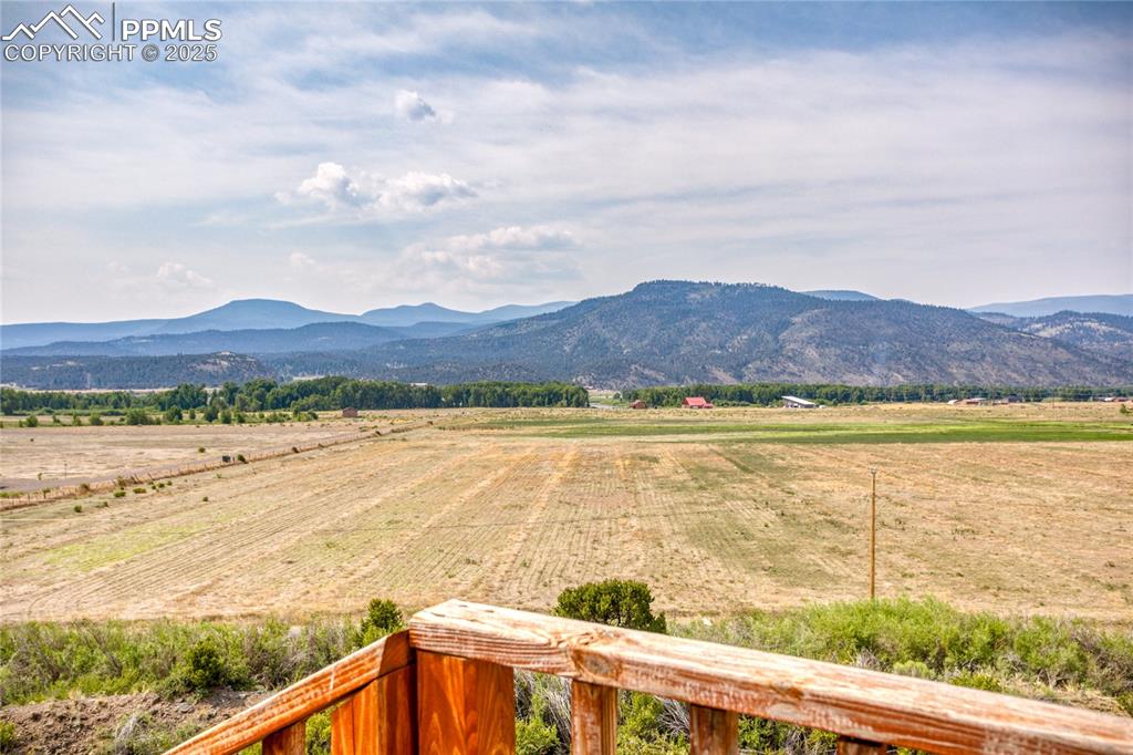 Image 45 of 50: View of mountain background featuring rural landscape