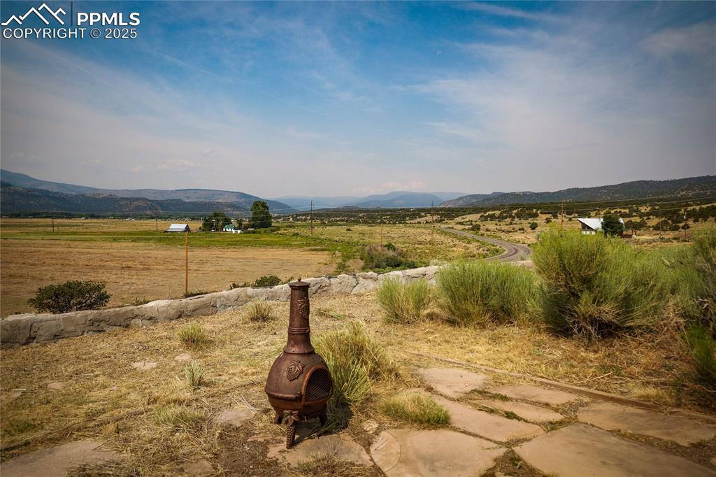 Image 50 of 50: View of mountain backdrop featuring rural landscape